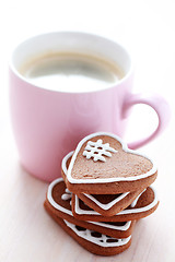 Image showing cup of coffee with cookies