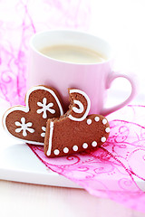 Image showing cup of coffee with cookies