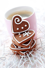 Image showing cup of coffee with cookies