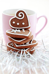 Image showing cup of coffee with cookies