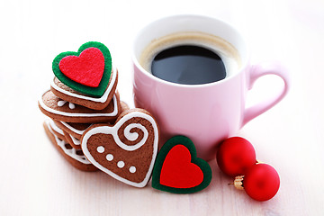 Image showing cup of coffee with cookies