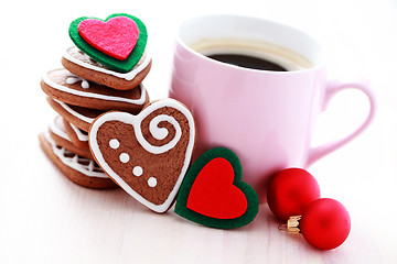 Image showing cup of coffee with cookies