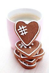 Image showing cup of coffee with cookies