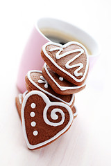 Image showing cup of coffee with cookies