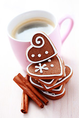 Image showing cup of coffee with cookies