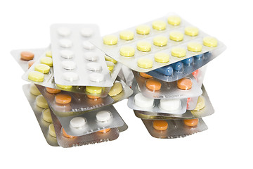 Image showing Packs of colored pills