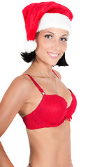 Image showing Portrait of beautiful woman in red santa hat