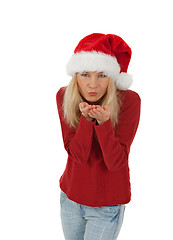 Image showing Santa girl sending a kiss