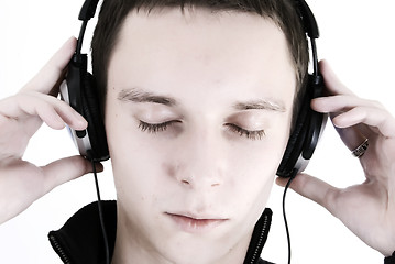 Image showing Young man in headphones   