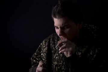 Image showing portrait of a young man with cigarette