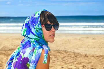 Image showing young beautiful woman with scarf in the beach