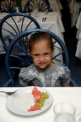 Image showing child at restaurant table