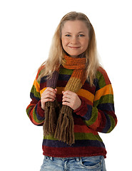 Image showing Smiling young woman wearing striped sweater