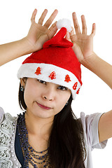 Image showing woman with santa claus hat