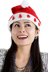 Image showing woman with santa claus hat