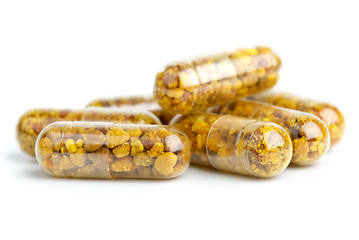 Image showing Some homeopathic pills with bee pollen