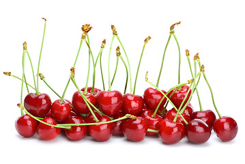 Image showing Some red cherries with stalks