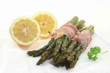 Image showing green asparagus in bacon coat