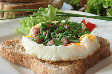 Image showing Fried eggs with ham