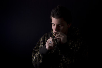 Image showing portrait of a young man with cigarette  