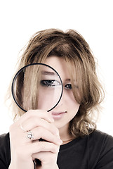 Image showing young girl with magnifying glass  