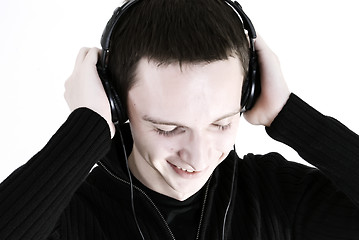 Image showing Young man in headphones   