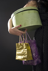 Image showing Young girl with shopping bags  