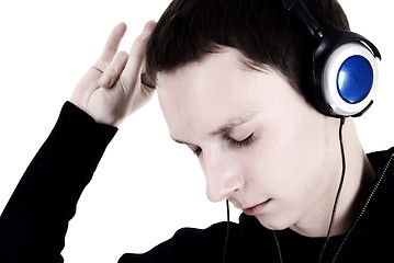 Image showing Young man in headphones   