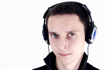 Image showing Young man in headphones   