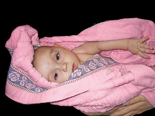 Image showing Baby in a pink towel