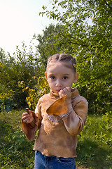 Image showing Girl eating chocolate