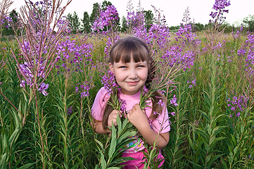 Image showing Girl with flowers kipreya