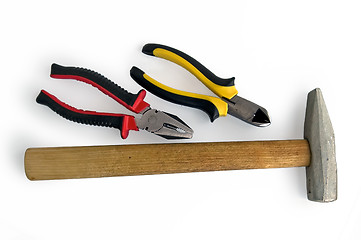 Image showing Pliers, side cutters and a hammer