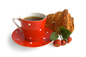 Image showing Red coffee cup with croissant and apple
