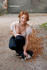 Image showing Beautiful woman with cat