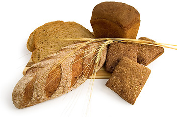 Image showing Rye bread with stalks of rye