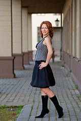 Image showing Beauty woman on the pavement street.