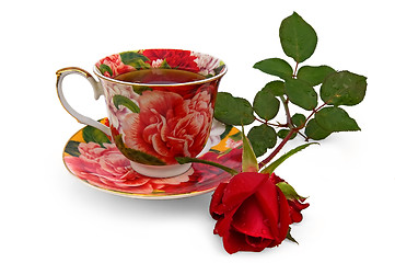 Image showing Tea in a cup with a rose