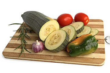 Image showing Zucchini with vegetables on the board