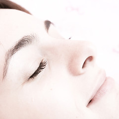 Image showing Beautiful young woman sleeping.