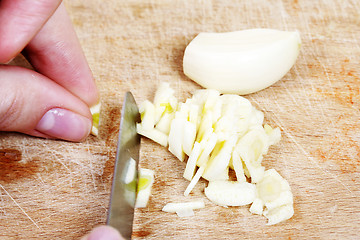 Image showing Chopping the Garlic