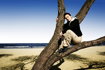 Image showing Girl in a tree