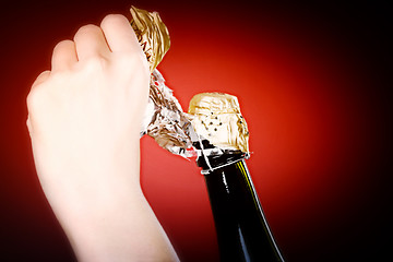 Image showing Opening champagne bottle