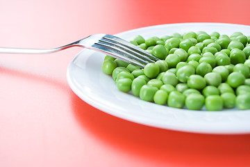 Image showing Green peas in plate