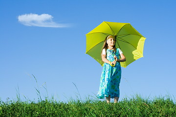 Image showing Girl at meadow with umbrella