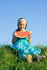 Image showing Girl with melon slice