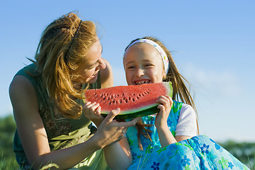 Image showing Happy child eating watermelon