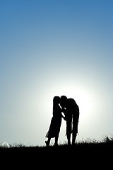 Image showing Mother and girl silhouette
