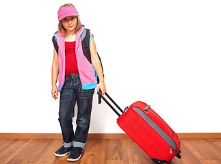 Image showing Little girl with luggage