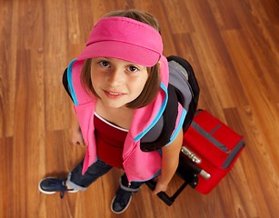 Image showing Little girl with luggage